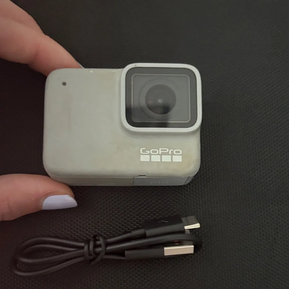 GoPro HERO 7 Black and Silver Action Camera with USB Cable